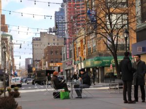 Reimagining our streets as places: from transit routes to community roots