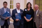 Accepting awards for the village of Hamburg are, left to right: Trustees Thomas Tallman, Paul Gaughan, & Laura Palisano Hackathorn, along with village Mayor Tom Moses. Accepting awards for the village of Hamburg are, left to right: Trustees Thomas Tallman, Paul Gaughan, & Laura Palisano Hackathorn, along with village Mayor Tom Moses.