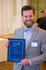 Kevin Hays of Savarino Development accepts an award for Five Hundred Seneca. Kevin Hays of Savarino Development accepts an award for Five Hundred Seneca.