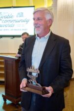 Doug Swift accepts an award for Larkin Square on behalf of Larkin Development. Doug Swift accepts an award for Larkin Square on behalf of Larkin Development.
