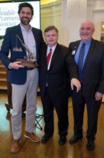 Justin Booth (at left) of GoBike Buffalo accepting one of the two overall awards, presented by Bill Tuyn (middle) and Don Erb (right). Justin Booth (at left) of GoBike Buffalo accepting one of the two overall awards, presented by Bill Tuyn (middle) and Don Erb (right).